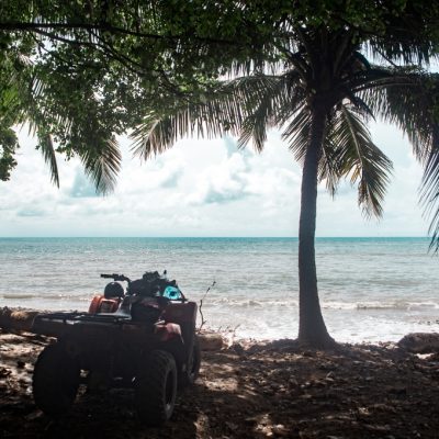 Red,Atv,(all,Terrain,Vehicle),Parked,Up,On,A,Road